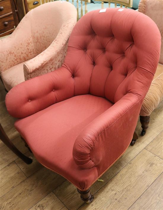 A Victorian buttonback armchair (pink)